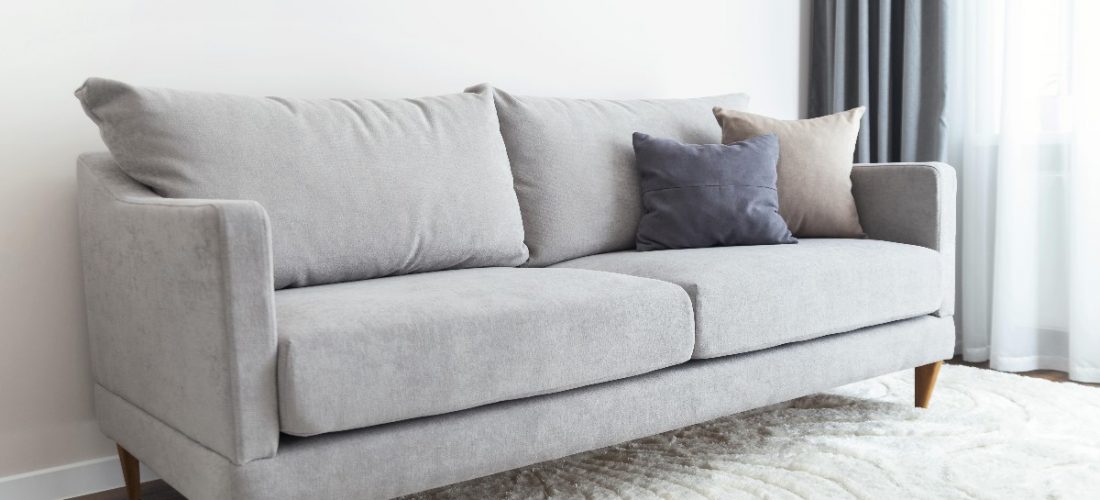 Leather or upholstered sofa? Pros and cons